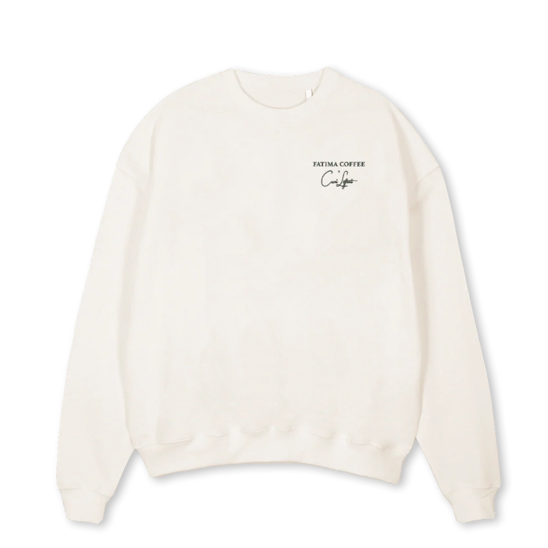 FATIMACREWVINTAGE Vintage White Oversized Crewneck Sweater.